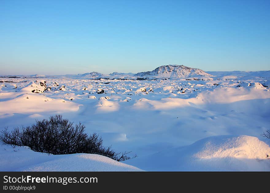 Snow covered landscape in winter, very cold and pristine. Snow covered landscape in winter, very cold and pristine