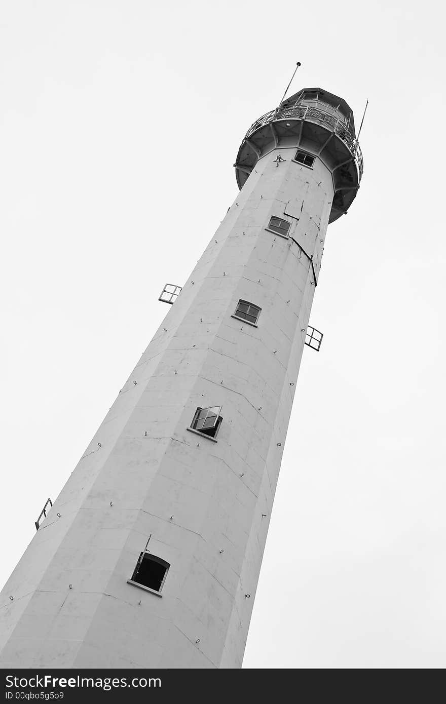 Photo of a lighthouse in black and white. Photo of a lighthouse in black and white