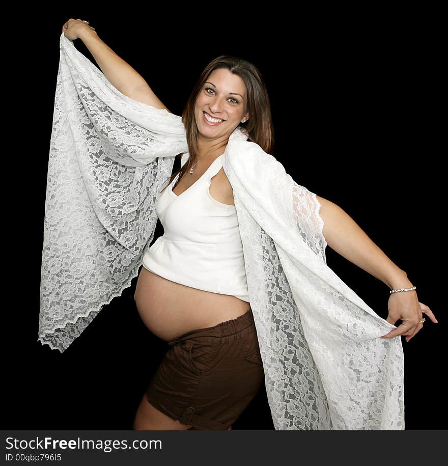 Beautiful expectant mother thrilled to be pregnant. Beautiful expectant mother thrilled to be pregnant.