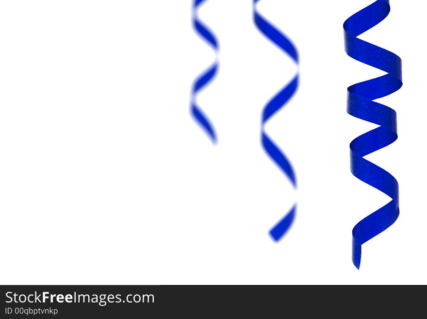 Blue streamers on white background