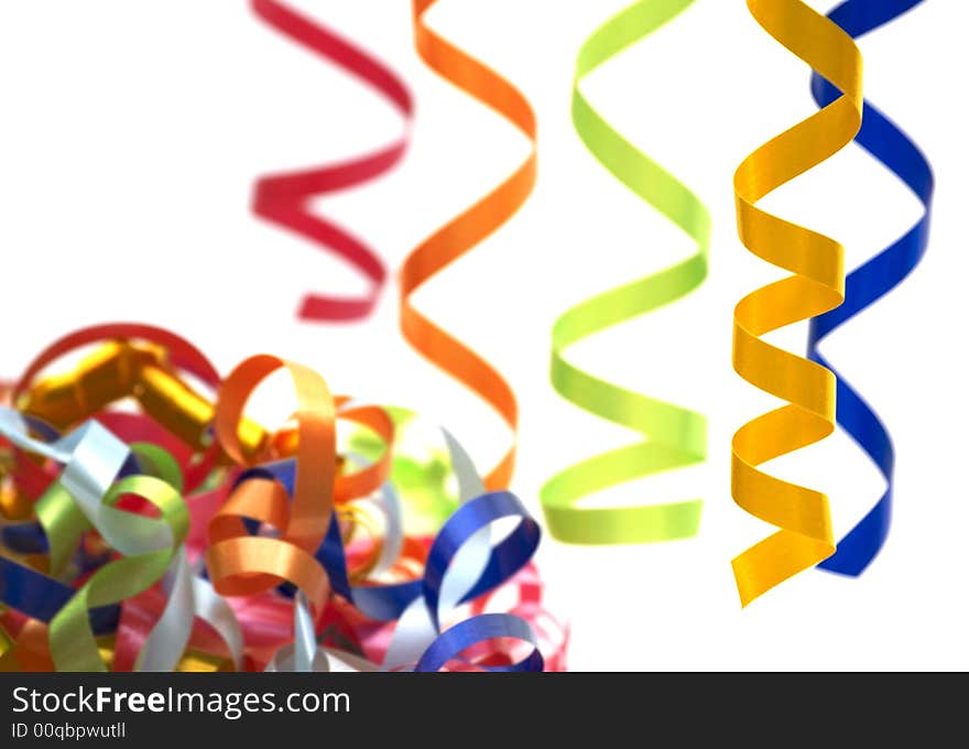 Colorful streamers on white background