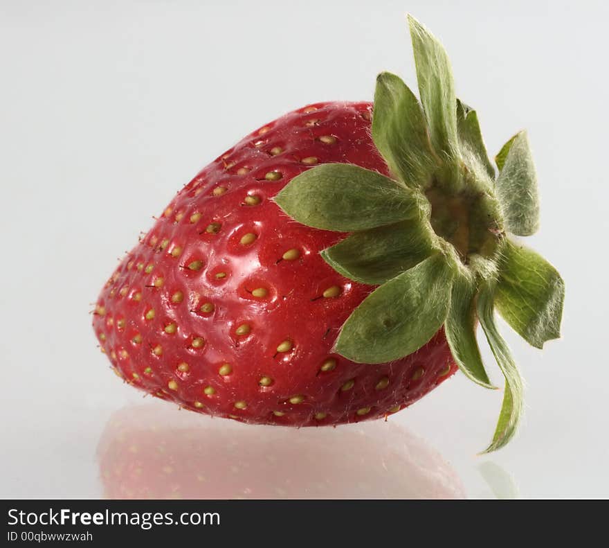 Freshly picked strawberry straight from the plant