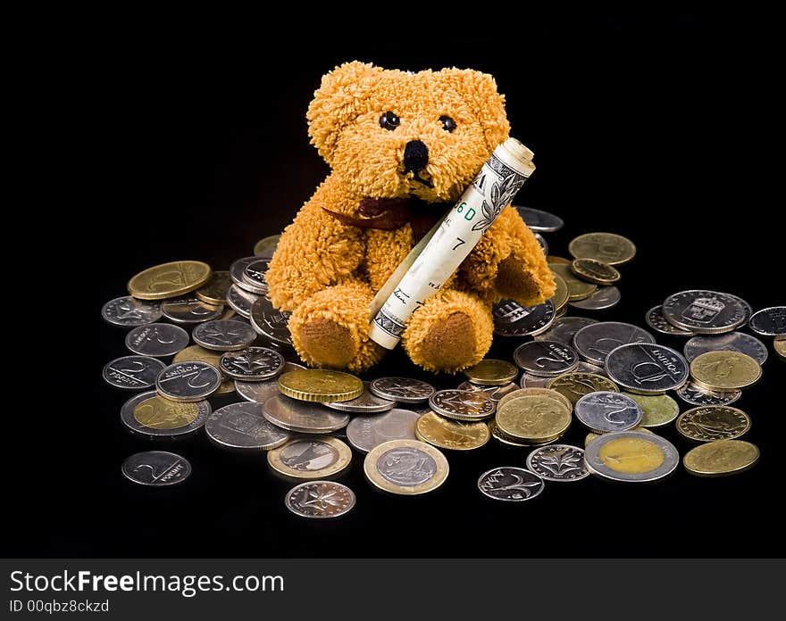 Teddy bear carrying Dollar Bill