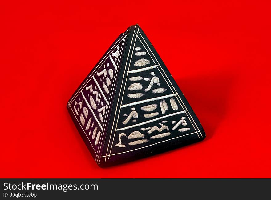 Black pyramid with egyptian hyerogliphs