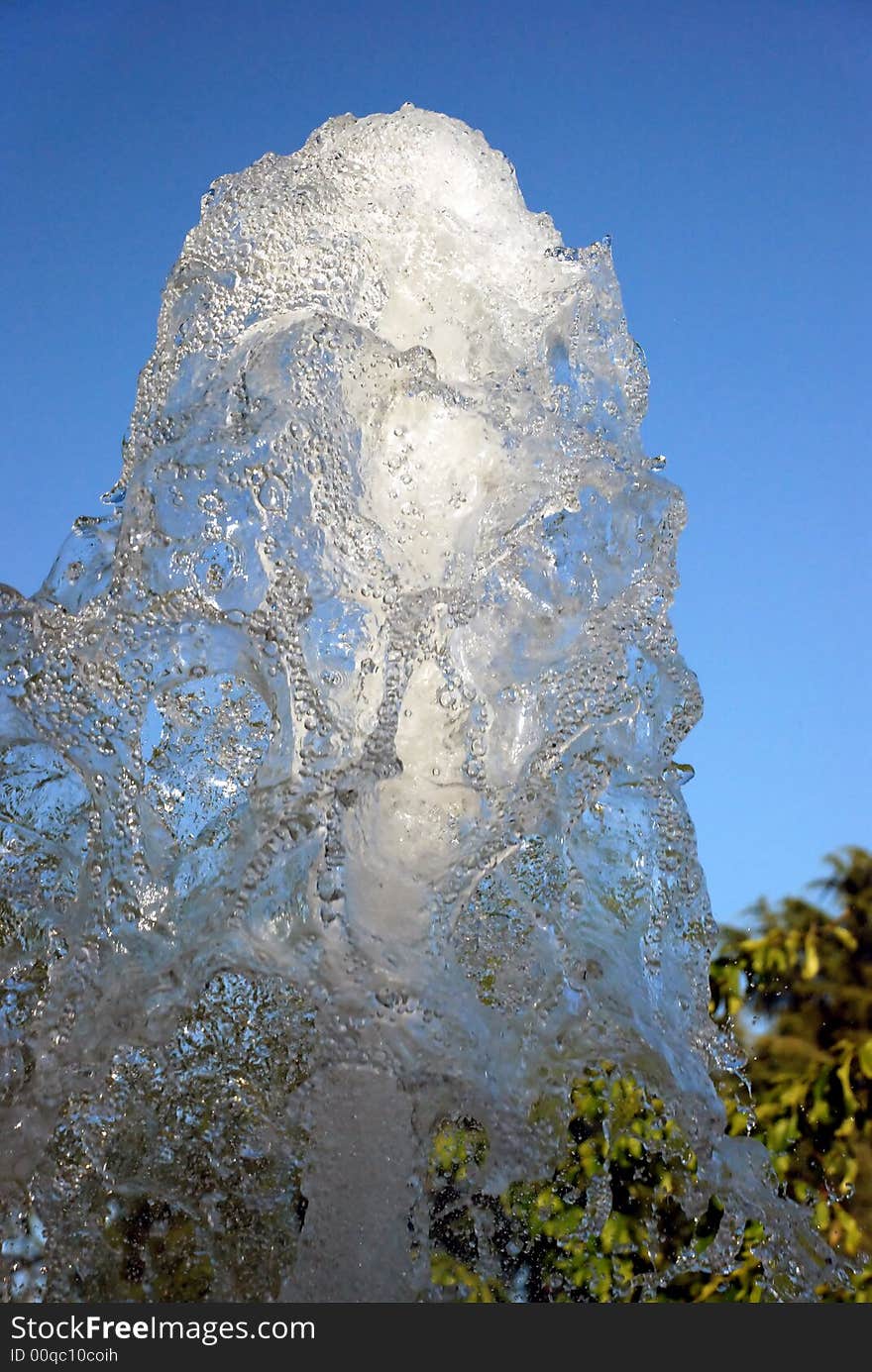 Water cascading upward toward the sky. Water cascading upward toward the sky