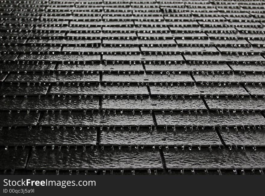 Pattern of icicles formed on roof shingles. Pattern of icicles formed on roof shingles