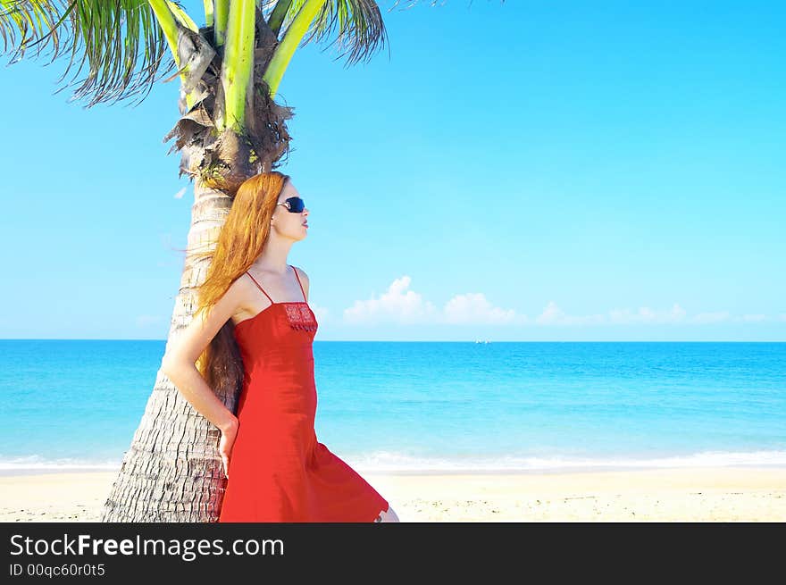 Portrait of a young red-hair female in summer environment. Portrait of a young red-hair female in summer environment