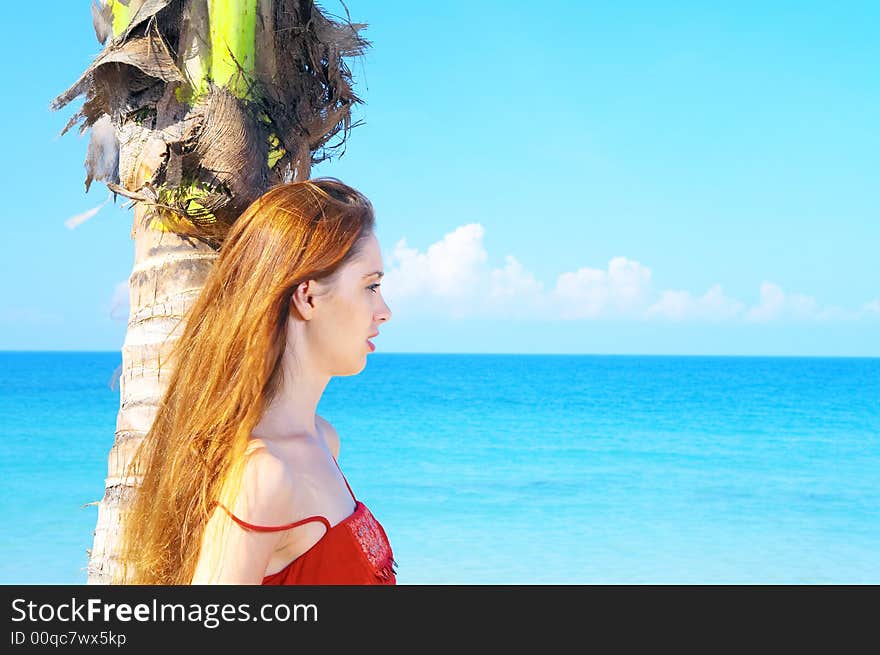 Portrait of a young red-hair female in summer environment. Portrait of a young red-hair female in summer environment