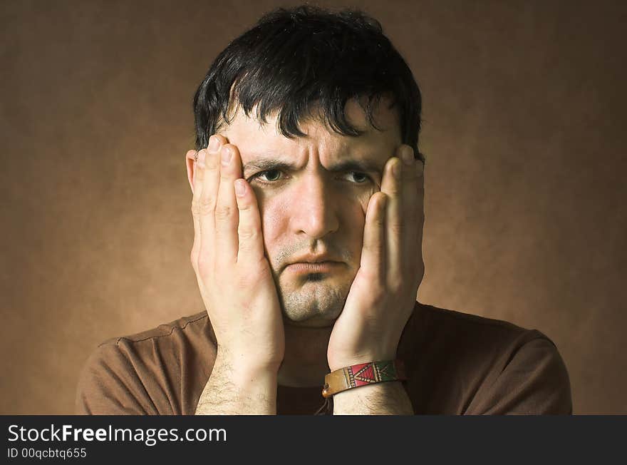 Portrait sad men on a dark background