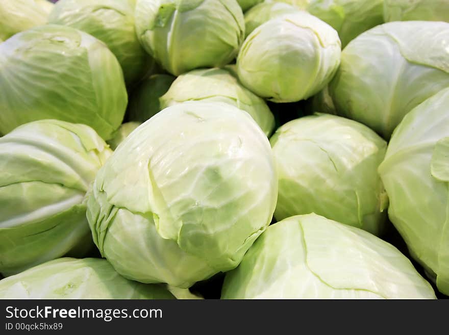 Fresh cabbage at a farmer's market. Fresh cabbage at a farmer's market.