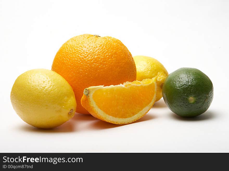 Orange, lemon, lime isolated on white