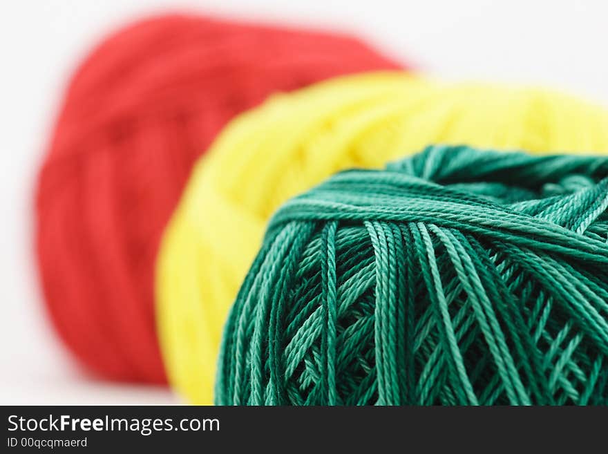 Photo of red, yellow, and green cottons. Photo of red, yellow, and green cottons.