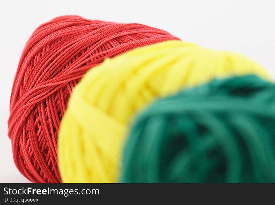 Photo of red, yellow, and green cottons. Photo of red, yellow, and green cottons.