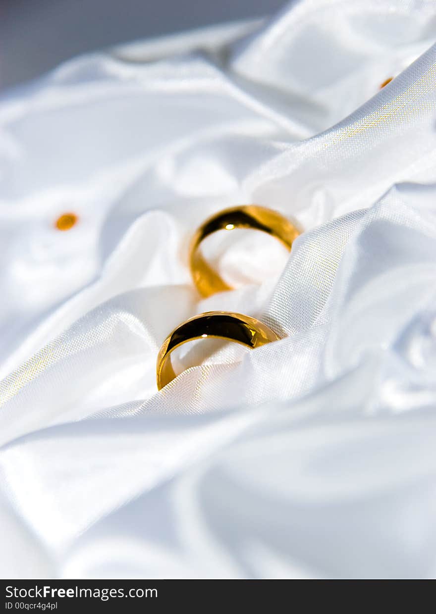 Wedding rings on a cushion