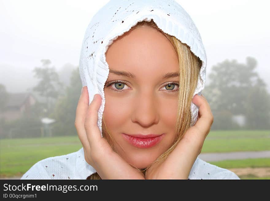 Beautiful girl in white hood