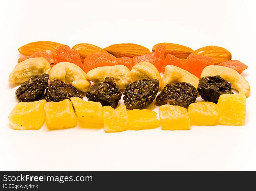 Rows of dried fruits and nuts