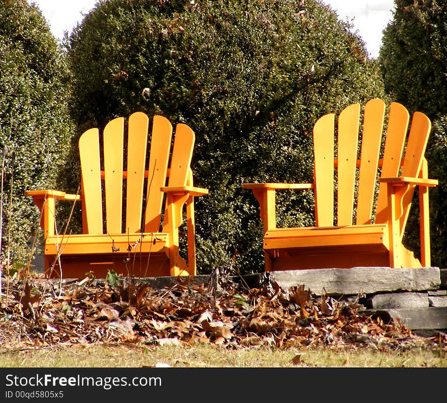 Two Adirondack Chairs