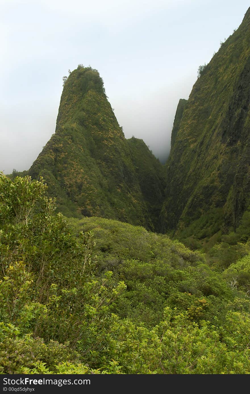 A green mountain looking like a needle. A green mountain looking like a needle