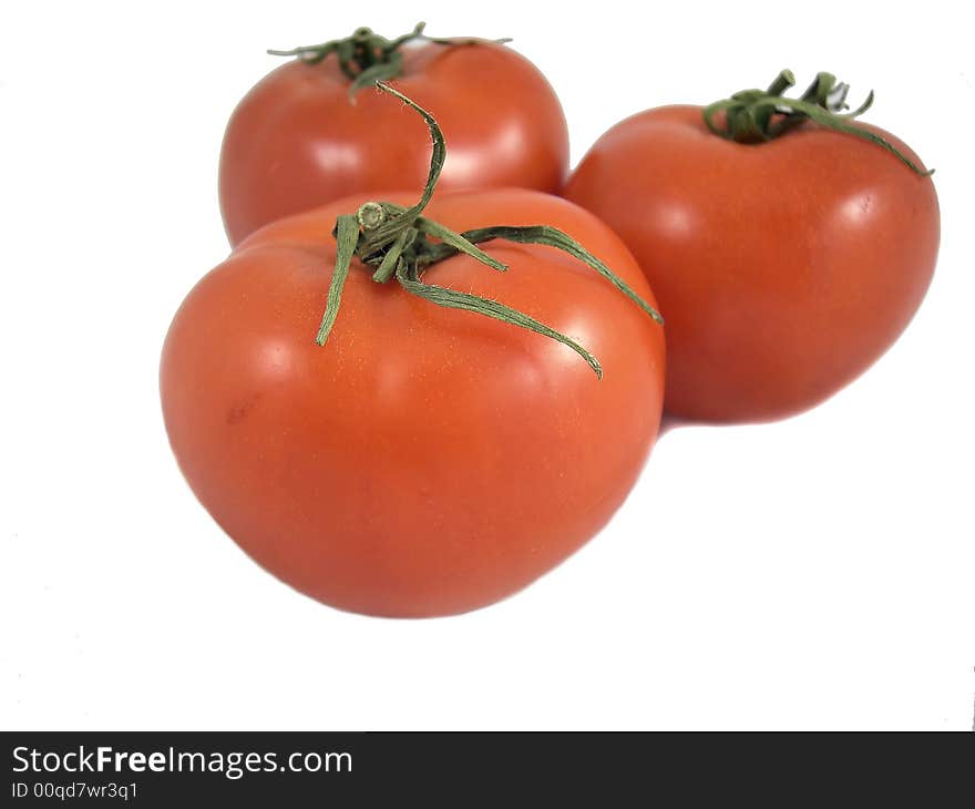 Tomatoes isolated on a white background. Close-up.