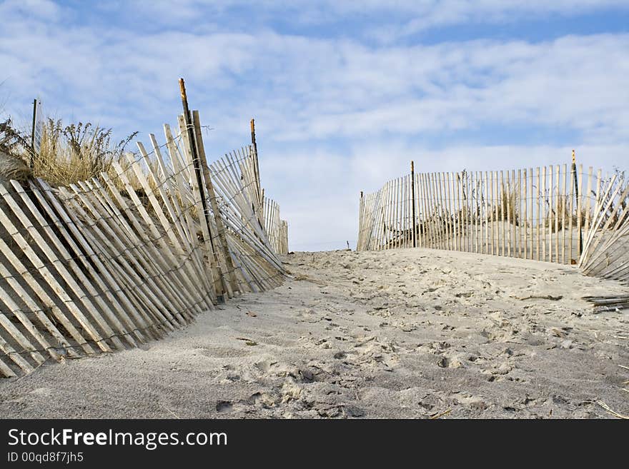 Sand dunes and fence