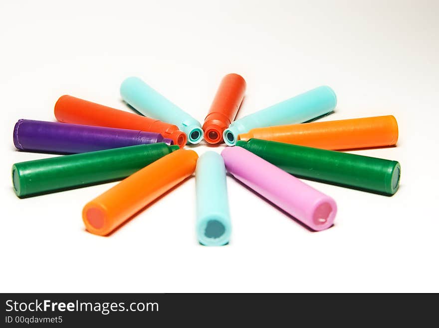 Color ink cups on white background