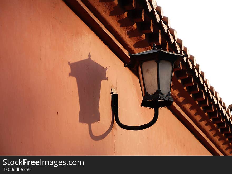 traditional lamp and red wall. traditional lamp and red wall