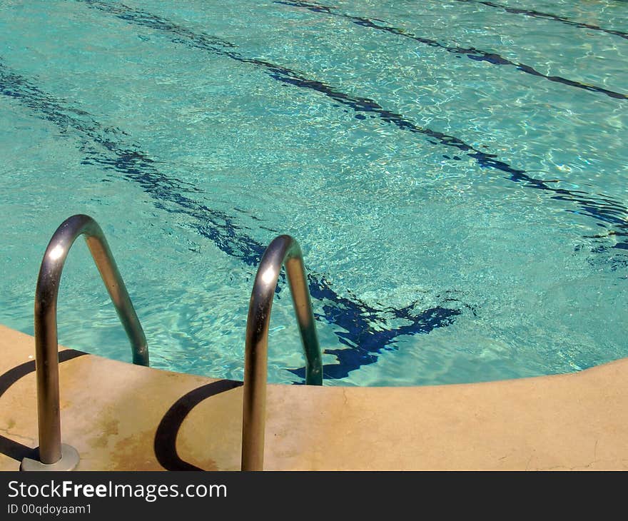 Swimming Pool with Turquoise Rippling Water. Swimming Pool with Turquoise Rippling Water