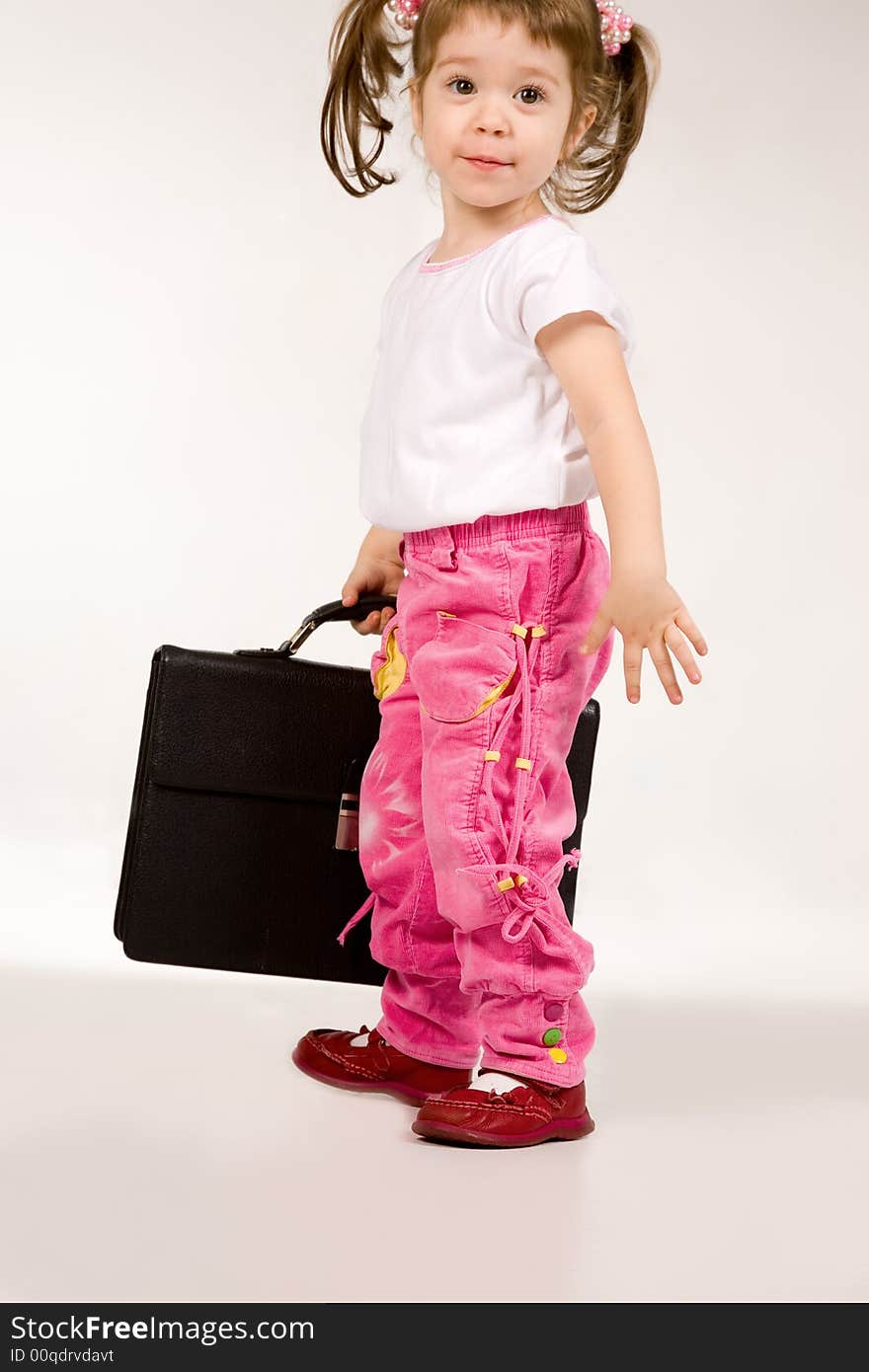 Little Girl With Suitcase On White