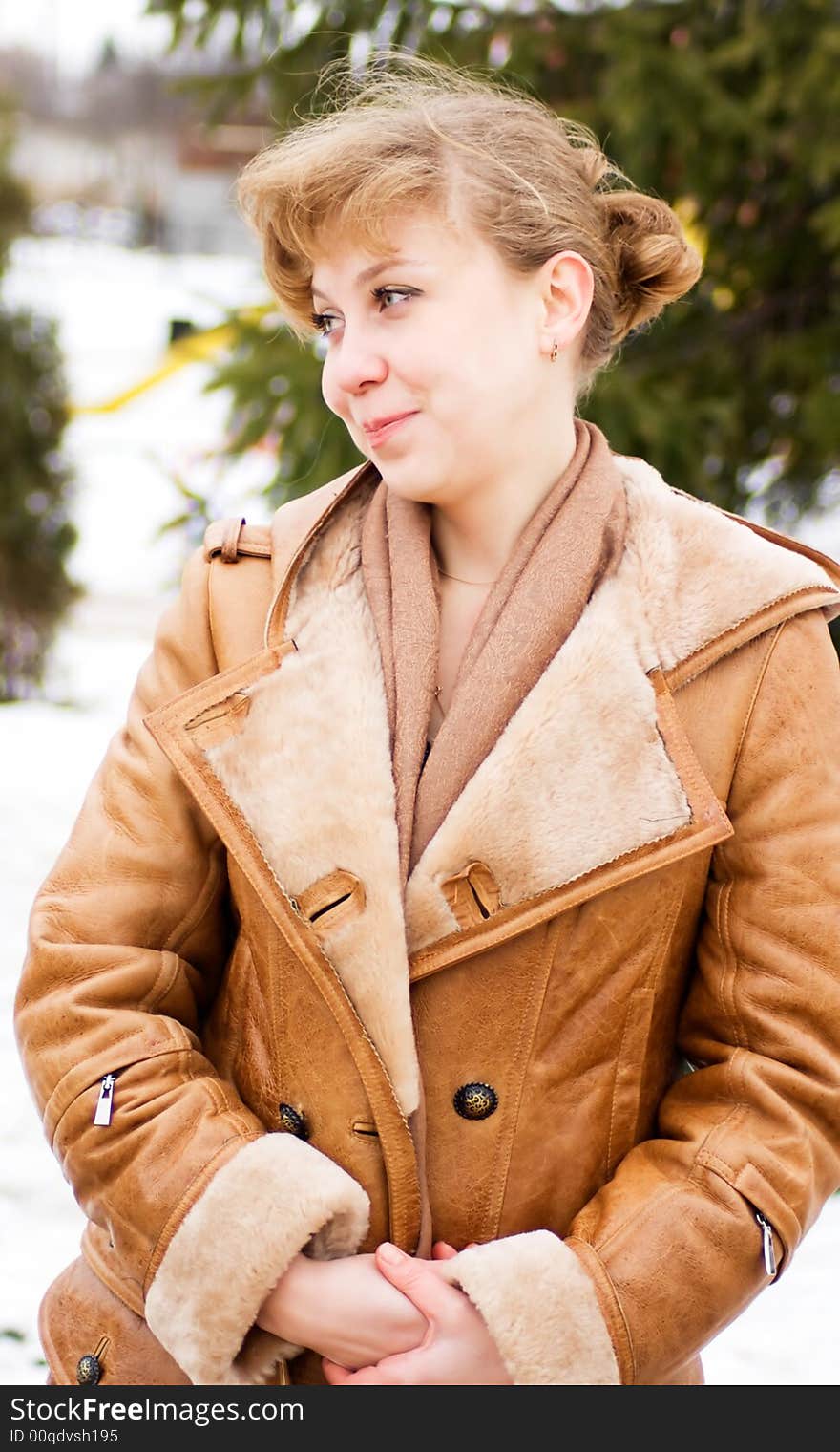 Confused young woman in leather jacket