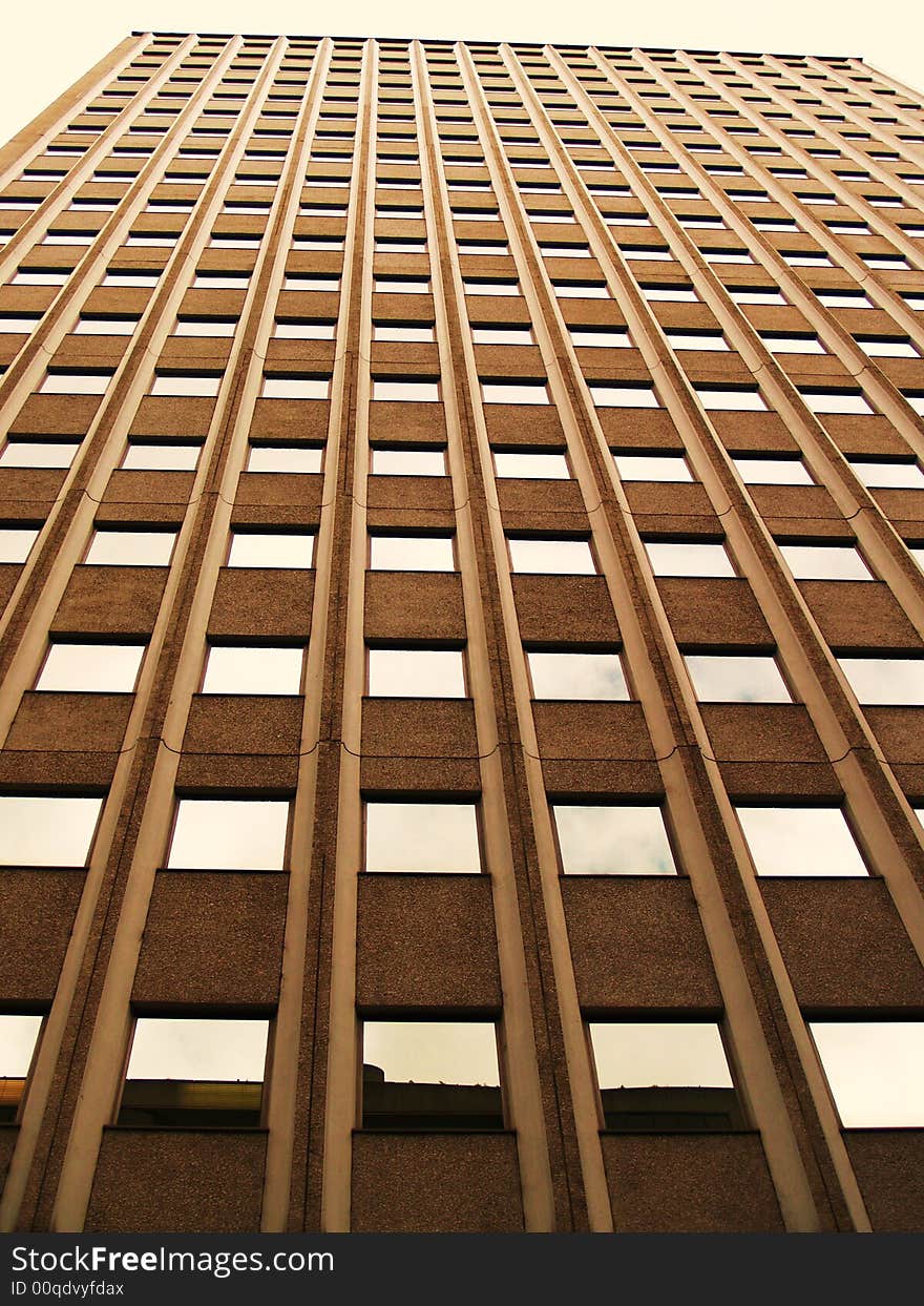 Looking up a building with lots of windows. Looking up a building with lots of windows.....