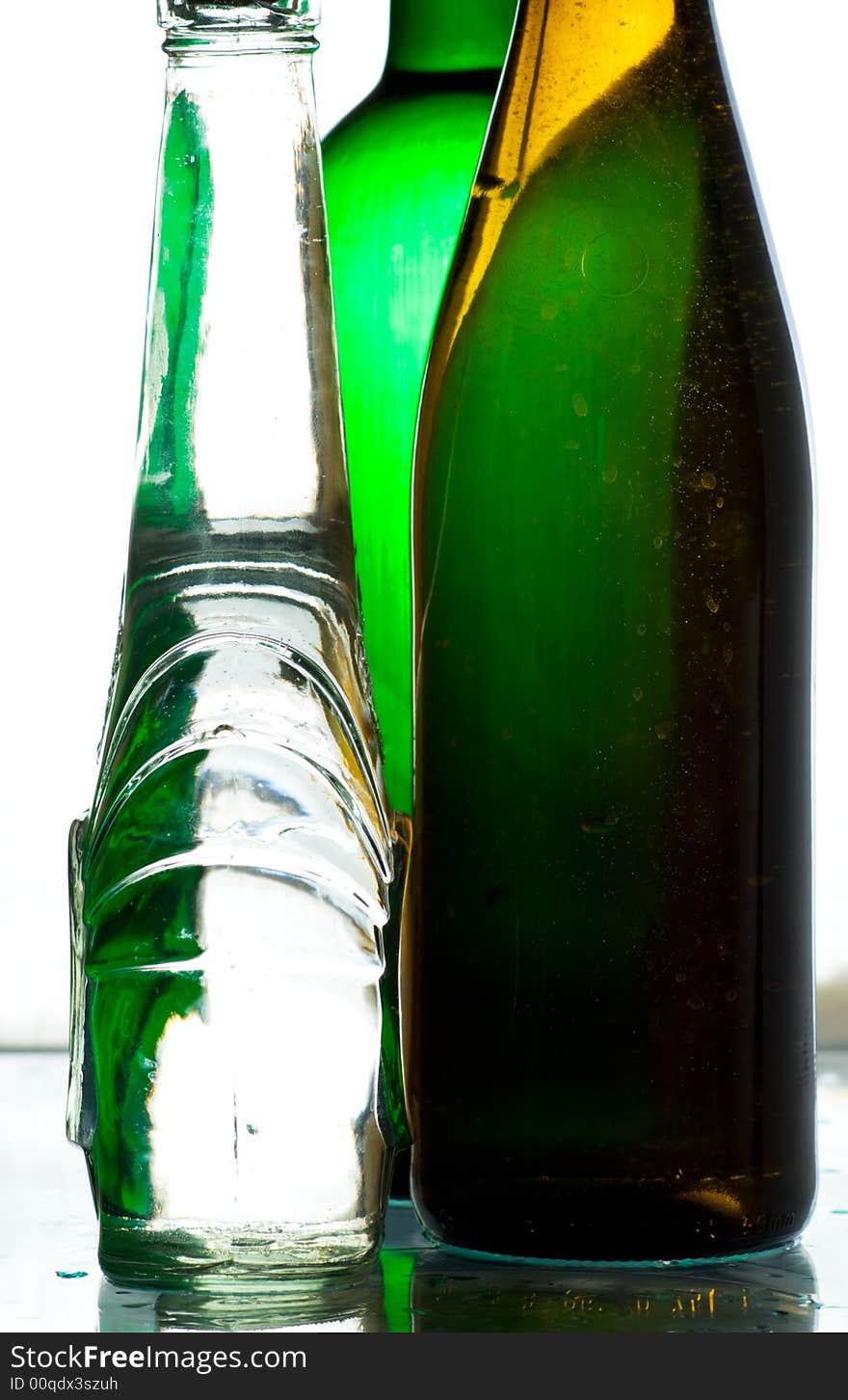 Some vine bottles with light and shadows