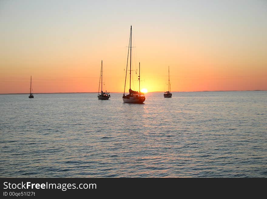 Sailboats at dawn