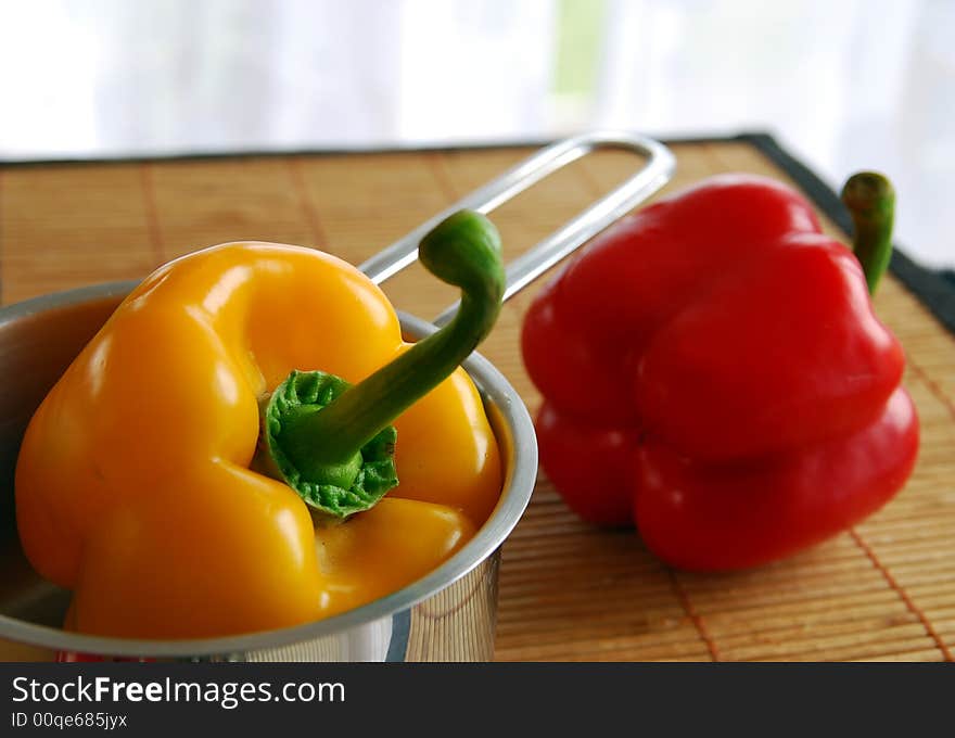 Yellow and red fresh bell peppers. Yellow and red fresh bell peppers