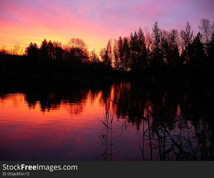 Very beautiful sunset. Early morning on the lake. Very beautiful sunset. Early morning on the lake.