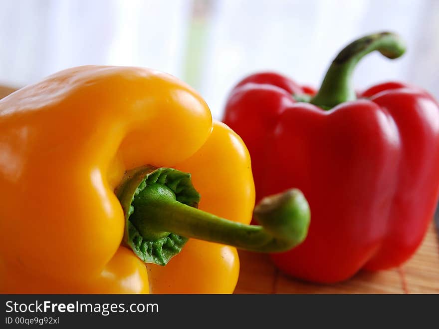 Yellow and red fresh bell peppers. Yellow and red fresh bell peppers