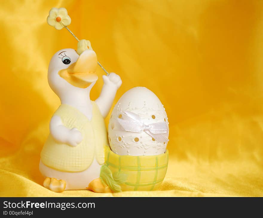 Easter egg on golden sateen background. Easter egg on golden sateen background