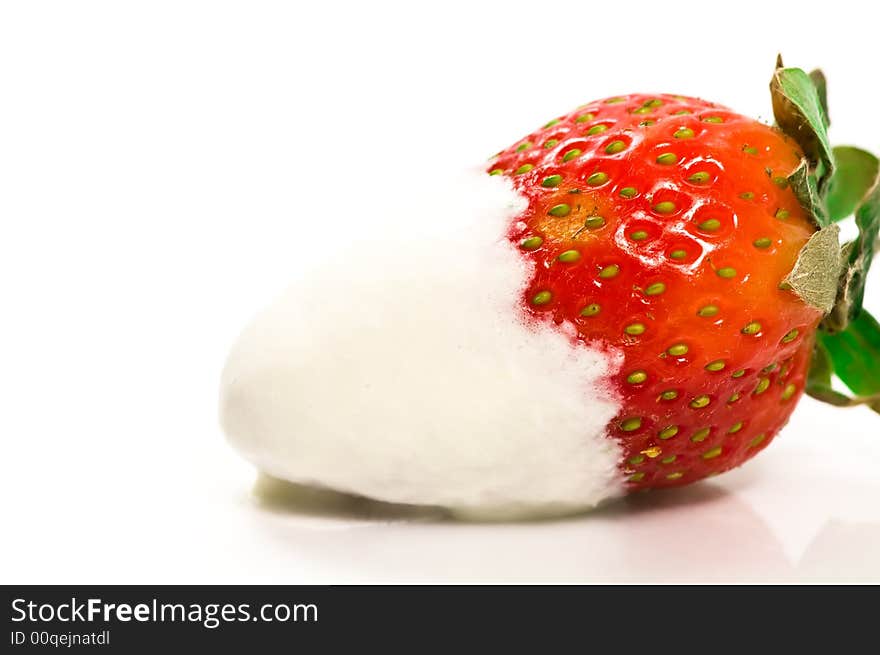 Close up on strawberry with cream. Close up on strawberry with cream