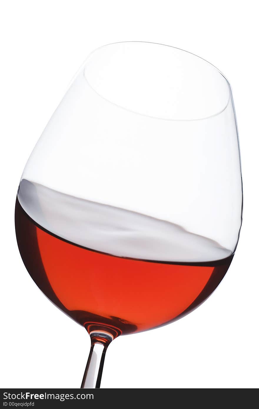 Isolated close up of red wine glass over a white background. Isolated close up of red wine glass over a white background