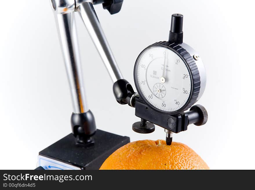 Measurement of an orange on a white background. Measurement of an orange on a white background