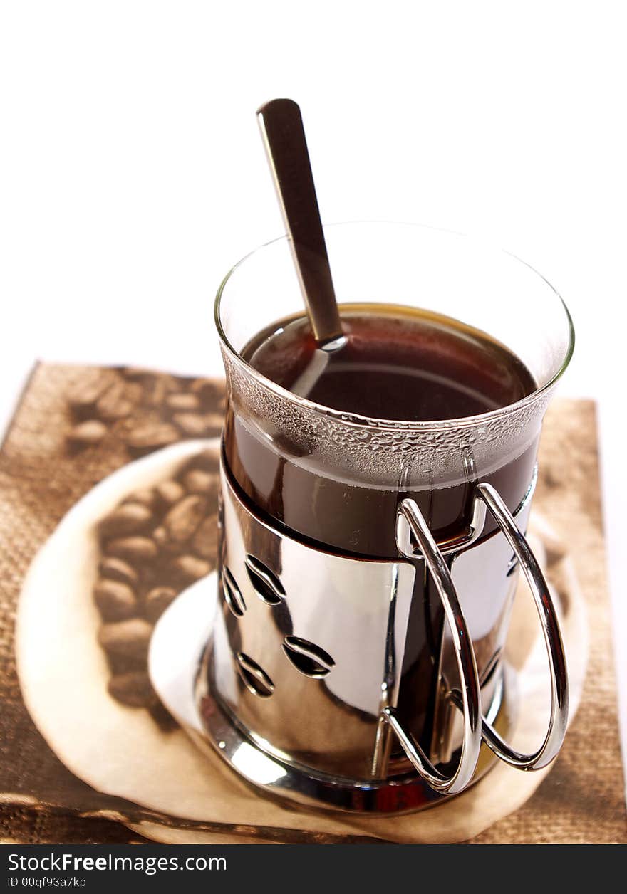 Isolated cup of coffee. metal and glass