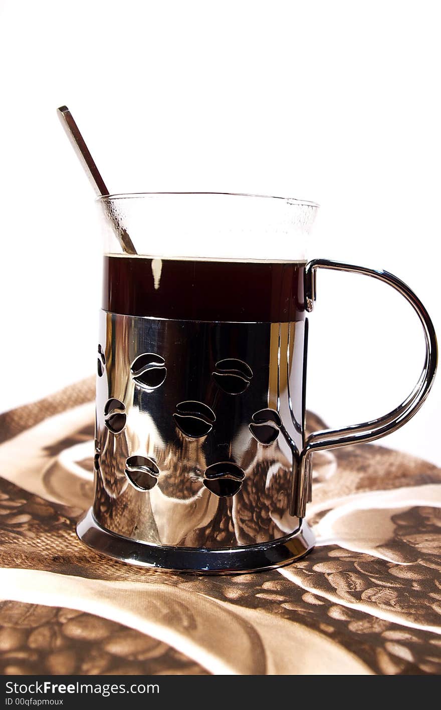 Isolated cup of coffee. metal and glass