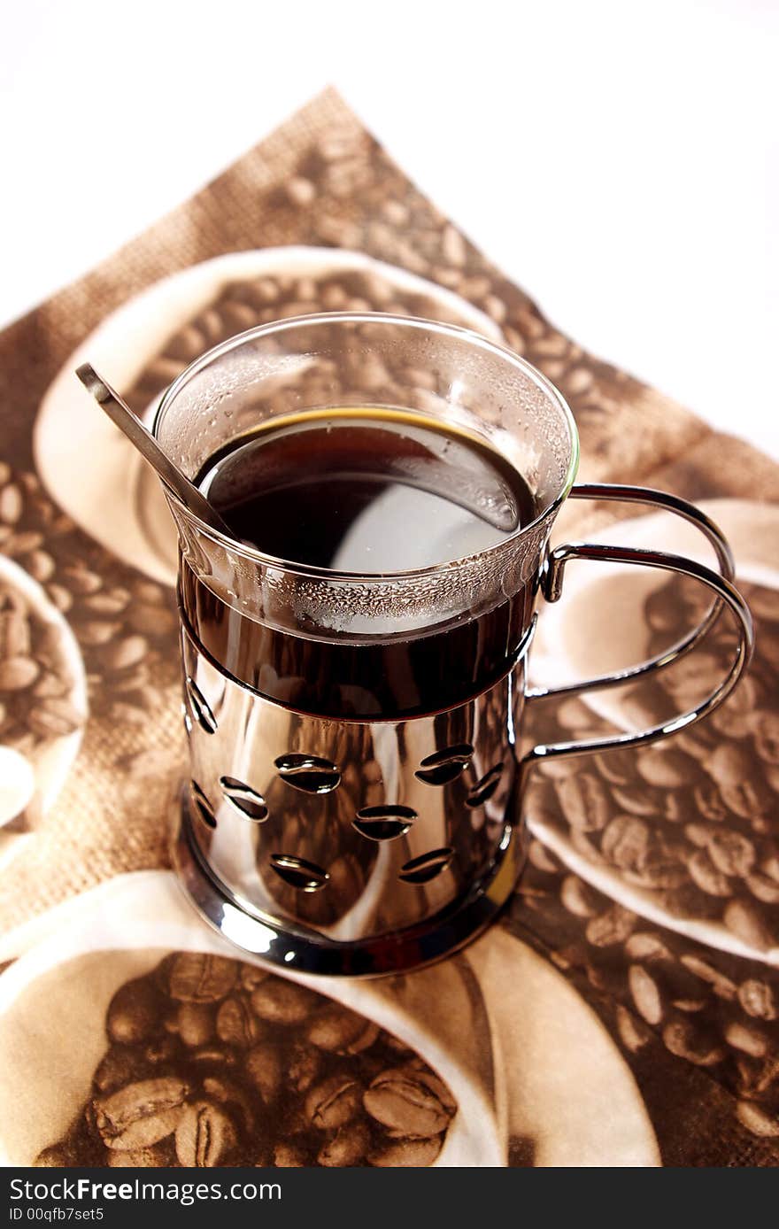 Isolated cup of coffee. metal and glass