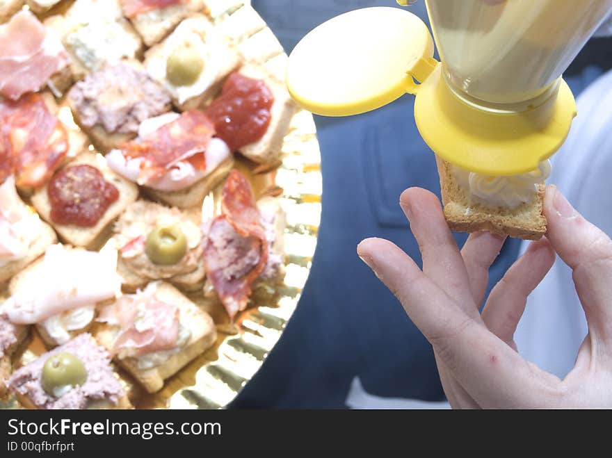 Hands of woman preparing food. Hands of woman preparing food.