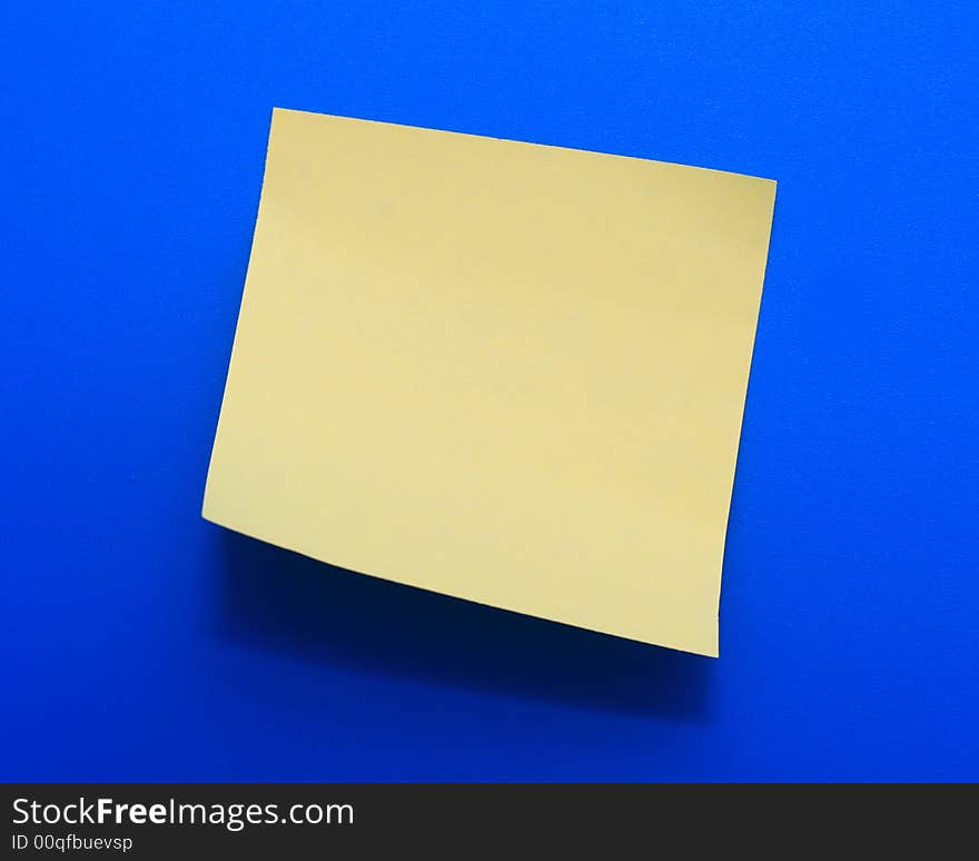 Yellow note paper on a blue background