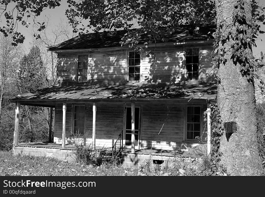 Black and white photo of an old abandoned house. Black and white photo of an old abandoned house