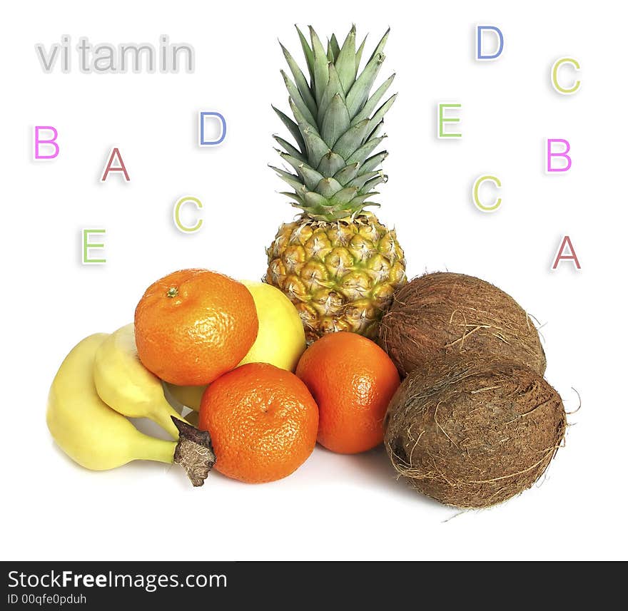 Tropical fruit and vitamins with white background.