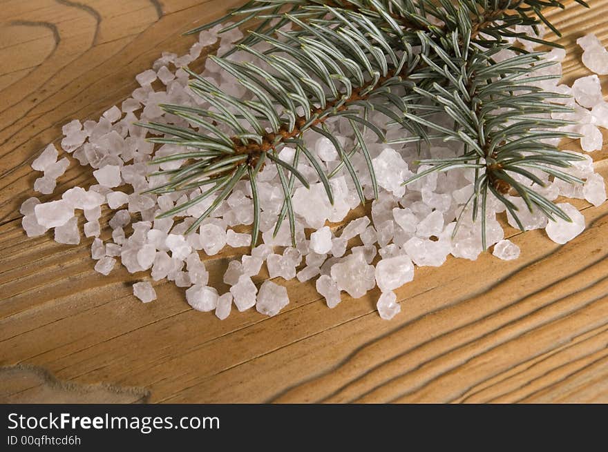 Pine bath items. sea salt with fresh branch on the old wood. Pine bath items. sea salt with fresh branch on the old wood