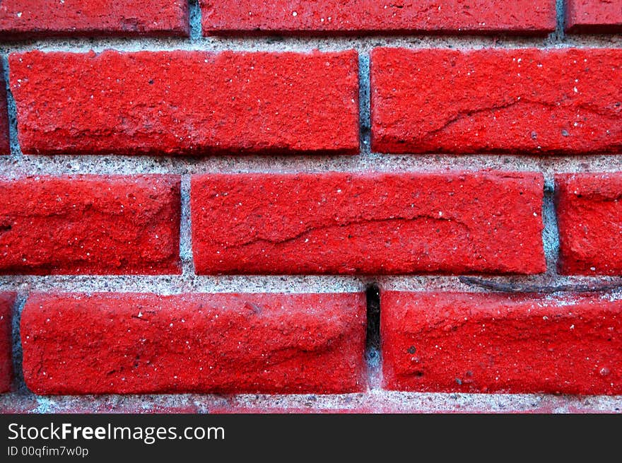 Detail shot of an old red brick wall