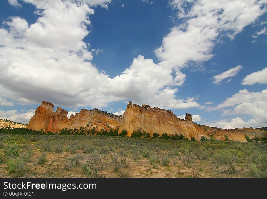 View of the red rock formations in Kodachrome Basin with blue skys and clouds. View of the red rock formations in Kodachrome Basin with blue skys and clouds