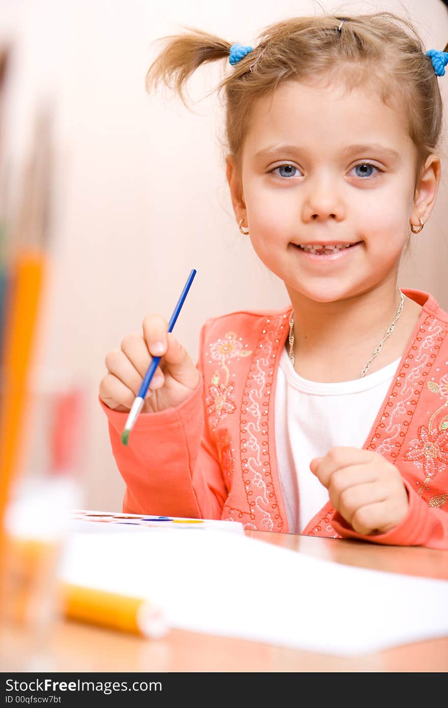 Pretty caucasian child watercolor paint